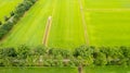 garden detail in aerial view with sand path going between two hedges towards a little building, a shed or chapel, in the Royalty Free Stock Photo