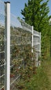 Garden fence and gate in rigid wire mesh panels