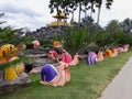 A garden filled with multicolored snail sculptures Royalty Free Stock Photo