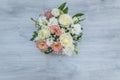 Garden flowers over grey wooden table background. Backdrop with copy space Royalty Free Stock Photo