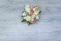 Garden flowers over grey wooden table background. Backdrop with copy space Royalty Free Stock Photo