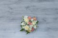 Garden flowers over grey wooden table background. Backdrop with copy space Royalty Free Stock Photo