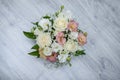 Garden flowers over grey wooden table background. Backdrop with copy space Royalty Free Stock Photo