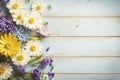 Garden flowers over wooden background stock photo Springtime