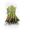 Organic garden fresh spring asparagus on white table cloth Royalty Free Stock Photo