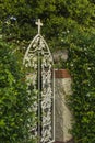 Garden Gate Surrounded by Vine-shrouded Walls Royalty Free Stock Photo