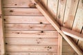 The gazebo roof ceiling made of light wood planks