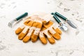 Garden gloves and gardening tools on old kitchen table Royalty Free Stock Photo