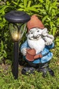 Garden gnome and lamp