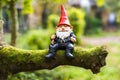 Garden gnome on a tree branch.