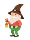 Garden gnome with a small flashlight oil lamp, dwarf, figurine or cartoon character,