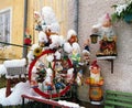 Garden gnomes covered with snow