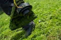 Garden grass trimmer closeup photo