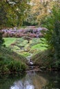 Garden at Great Chalfield Manor near Bradford on Avon, Wiltshire, UK, photographed from across the moat in autumn. Royalty Free Stock Photo