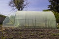 Garden greenhouse with metal frame Royalty Free Stock Photo