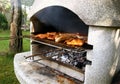 Garden grill with steaks and sausages