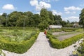 Garden with herbs and vegetables behind the buildings at Gammel Estrup Castle