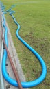 Garden hose on the field.