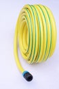 Garden hose-pipe on white Royalty Free Stock Photo