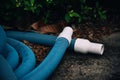 garden hose tips on the ground Royalty Free Stock Photo
