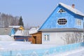 Garden house with a blue attic. Winter.