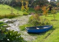 Rowing boat moored on the lake Royalty Free Stock Photo