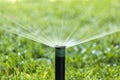 Garden Irrigation system spray watering lawn. Royalty Free Stock Photo