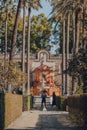 Garden of the Ladies in Alcazar of Seville, Spain, Neptune statue and fountain on background Royalty Free Stock Photo