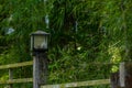 A garden lamp on the side of the road to add to the beauty as well as street lighting Royalty Free Stock Photo