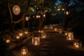 garden with lanterns, string lights, and candle lanterns for romantic nighttime setting Royalty Free Stock Photo