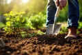 In the garden, a man digs with a shovel Royalty Free Stock Photo