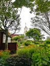 Garden, parc in the center of TorshÃ¡vn next to the Panama CafÃ© and the clock tower, Faroe Island Royalty Free Stock Photo