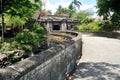 Garden park and ancient antique vintage retro gate entrance of Baluarte de San Andres Spanish colonial fortification in the