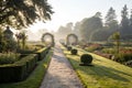 Garden Path Through Formal Garden in the Morning Light Royalty Free Stock Photo