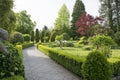 Garden path in formal garden with morning light Royalty Free Stock Photo