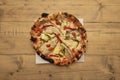 Garden pizza with sliced aubergine with zucchini slices, bell pepper strips,