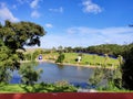 Garden with a pond in BacalhÃÂ´a Buddha Eden