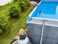 Garden pool with sand filter system Royalty Free Stock Photo