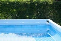 Garden pool in the sun Royalty Free Stock Photo