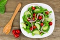 Garden salad with wood background, overhead view with fork Royalty Free Stock Photo