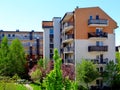 Decorative green spring trees and pink blossom. condo elevation with balconies Royalty Free Stock Photo