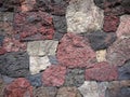 Garden: scoria lava rock wall Royalty Free Stock Photo