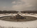 Garden sculptures and pond in front of the royal residence at Versailles near Paris in France in winter scenery Royalty Free Stock Photo