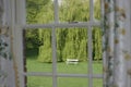 Garden Seat Seen through window Royalty Free Stock Photo