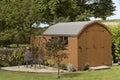 Garden shed and patio with seating Royalty Free Stock Photo