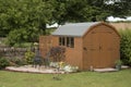 A garden shed and small patio Royalty Free Stock Photo