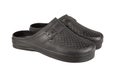 Garden shoes - low black shoes for gardening work on a white