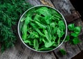 Garden sorrel in a bowl on wooden table. Royalty Free Stock Photo