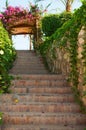 Garden Stairway with Floral Trellis Royalty Free Stock Photo