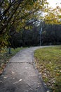 Garden stone path in park in autumn Royalty Free Stock Photo